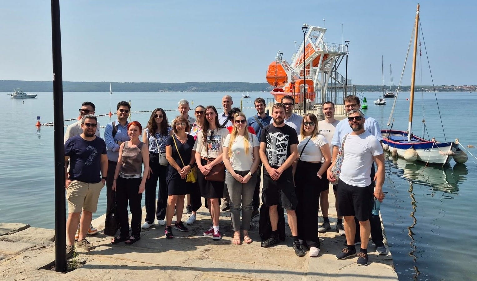 Hands-On Maritime Training – Bridging Theory and Practice Professionals engaged in maritime training inside a simulation or classroom environment with technical equipment.