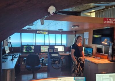 Exterior view of the Faculty of Maritime Studies and Transport building with signage and a modern architectural style.
